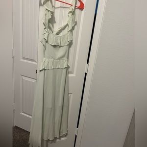 Cute summer sheer linen dress, never worn, has tags.